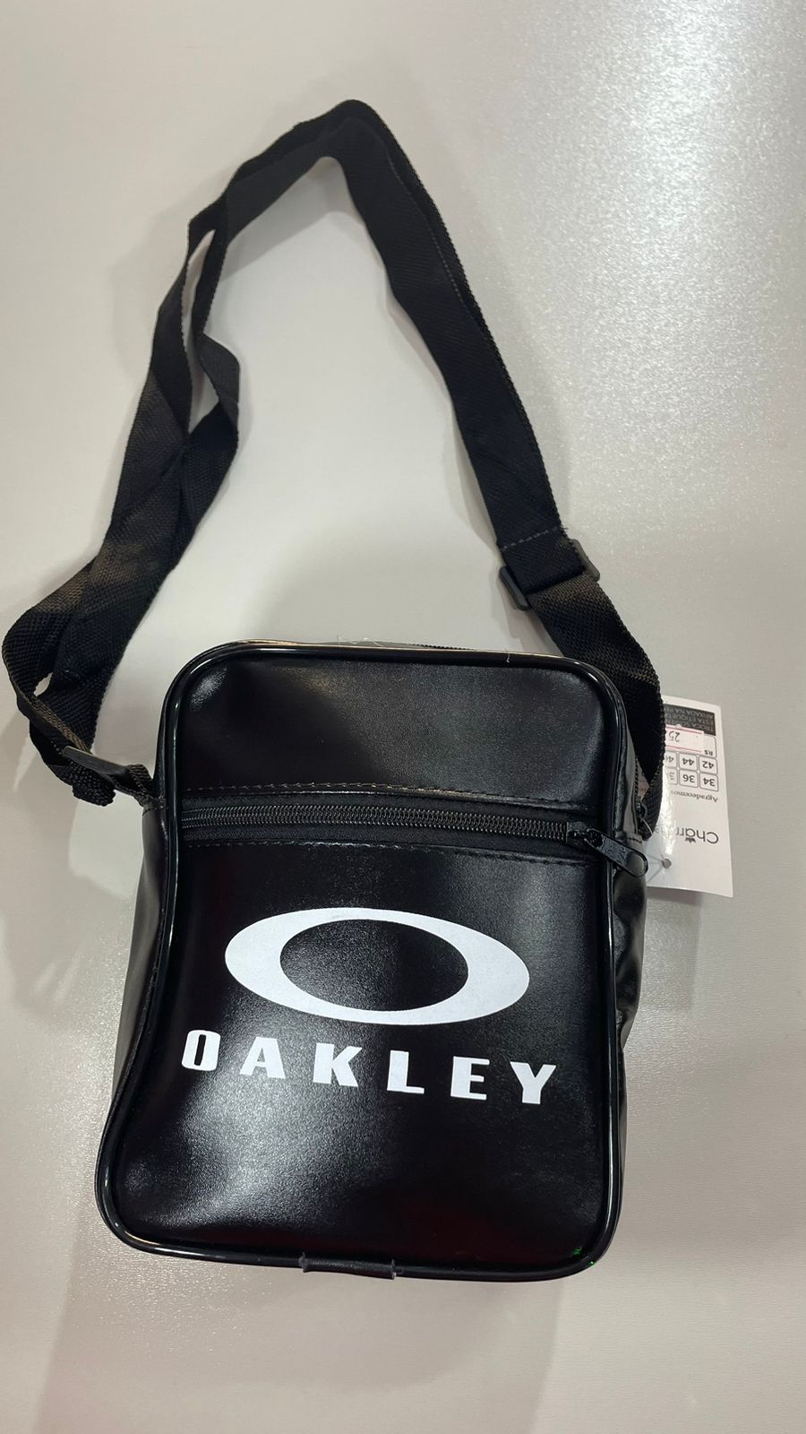 bolsa lateral oakley